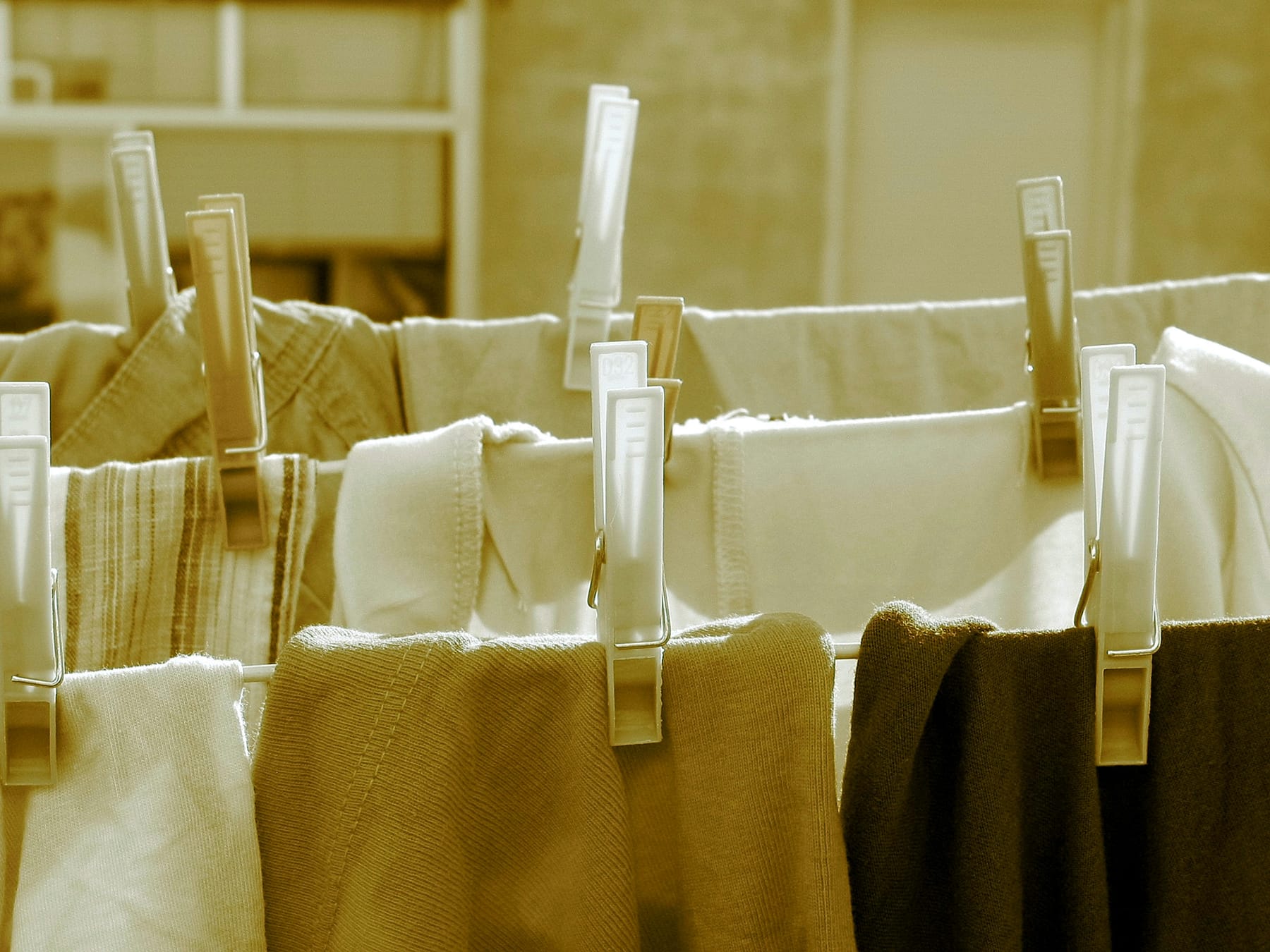 Clothes pegged out to dry on a washing line.